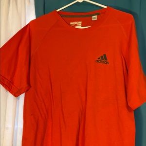 Neon orange adidas shirt
